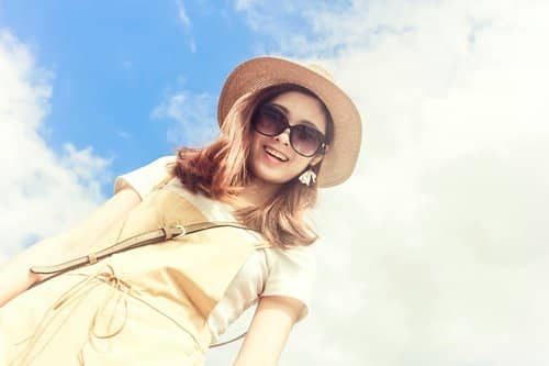 wearing hats and sunscreens are ways to reduce sun exposure