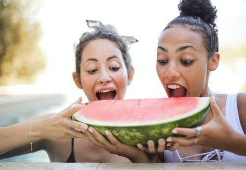 women eating watermelon as part of intermittent fasting for women